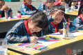济南百名学生校园操场作画共绘“中国梦”